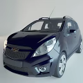 Dark Blue Compact Chevrolet Car With Roof Rack And Silver Wheels Design
