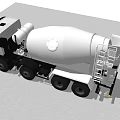 Gray Concrete Mixer Truck Parked At Industrial Construction Site With Blue Wall