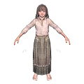Woman with long hair wearing light colored long sleeved top and patterned long skirt barefoot