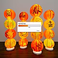Decorative Traditional Chinese Orange Yellow Lanterns Stacked With Calligraphy On Wooden Base