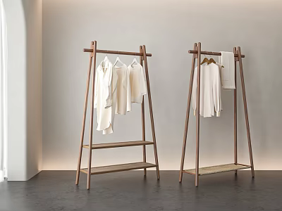 Modern Wooden Clothes Hangers With White Garments In Interior 3d model