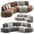 Curved Sectional Multi Person Sofa In Brown Gray Plush Material With Decorative Pillows And Throw Blanket