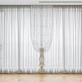 Elegant White Sheer Curtains With Lace Details And Tiebacks In Minimalist Interior Wooden Floor