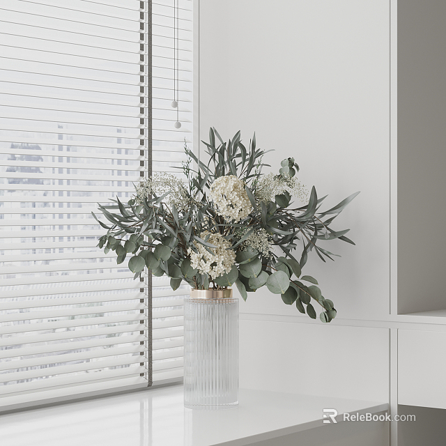 Transparent Glass Vase With White Flowers And Green Leaves Against White Blinds 3d model 