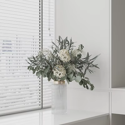 Transparent Glass Vase With White Flowers And Green Leaves Against White Blinds 3d model