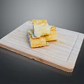 Golden Pastry Pieces Stacked On Wooden Cutting Board For Serving