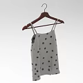 Light Gray Camisole With Black Polka Dots Hanging On Wooden Hanger