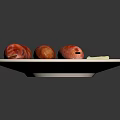 Grilled Sausages on Skewers Served on White Plate With Garlic Cloves