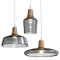 Three Modern Pendant Lamps with Wooden Tops and Transparent Glass Shades