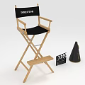 Wooden Director Armchair in Film Set with Black Seat Clapperboard and Megaphone