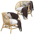 Natural Style Wicker Single Sofa With White Cushion Dark Blanket And Decorative Pillow
