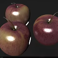 Three Fresh Apples with Pink and White Skin on a Smooth Gray Surface Looking Juicy