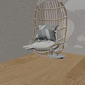 Woven Rattan Hanging Chair With Striped Pillow And Fluffy Cushion On Light Wooden Floor