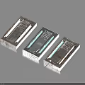 Three Shiny Metal Rectangular Components Featuring Striped Design On Light Blue Background