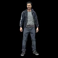 Man Standing in Black Jacket Gray T-Shirt Dark Pants and Gray Shoes on Black Background