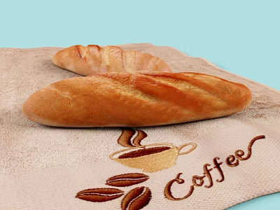 Fresh Baguette Loaves On Coffee Themed Towel With Embroidered Coffee Cup And Beans Design 3d model