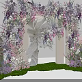 Floral Decorated Event Entrance Arch With Purple Pink Flowers And Green Grass