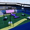 Football Stadium Featuring Arched Roof Stand Seats Purple Central Stage Green Pitch And Blue Track