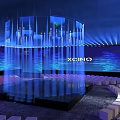 XCIND Modern Stage with Blue Lighting Illuminated Pillars and Audience Seats