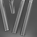 Stainless Steel Threaded Rods Arranged On Dark Background For Industrial Applications