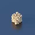 Cube Shaped Household Item Made of Small White Beads on Blue Surface with Reflection
