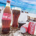 Coca Cola Classic Bottle Glass With Ice On Sunny Beach Featuring Cans Chairs And Umbrella