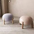 Purple and Beige Round Upholstered Stools with Wooden Legs in Modern Indoor Decor