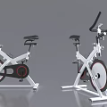 Modern Stationary Exercise Bikes With White Frame Black Seat And Red Accents
