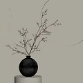Elegant Black Vase With Branches And Small Fruits Against Circular Moon Background