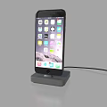 Sleek Modern Smartphone On Charging Dock Being Charged With Cable 3d model
