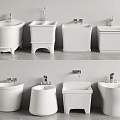 White Bathroom Fixtures With Pedestal Bases And Faucets In Various Designs