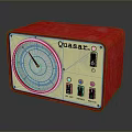 Red Quasar Vintage Device With Round Dial Buttons And Indicator Lights