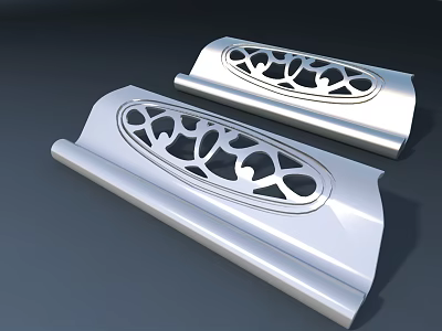 Silver Decorative Ornamental Pieces With Intricate Cutout Patterns And Curved Edges 3d model