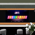 Modern KTV Private Room Featuring Large Screen Song Selection And White Roses Decor