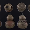 Three Gourd Shaped Sculptures With Carved Patterns And Knotted Rope Decorations