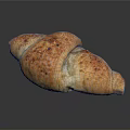 Golden Crispy Freshly Baked Croissant With Flaky Interior Shiny Crust On Black Reflective Surface