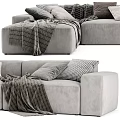 Neutral Gray Sectional Sofa With Cozy Blankets And Decorative Pillows 3d model