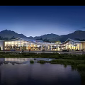 Modern Sales Office Building with Glass Curtain Walls Among Mountains and Water Nighttime Lighting Reflection