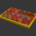 Orange Cup Shaped Pastries Arranged In Yellow Tray With Glossy Surface