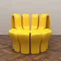 Yellow Outdoor Chair with Unique Curved Structure on Wooden Floor Modern Space