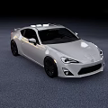Silver Sports Car Two Door Coupe With Sleek Aerodynamic Body And Black Alloy Wheels