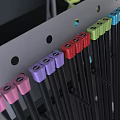 Colorful Dumbbells Yoga Ball And Foam Roller On Sports Equipment Storage Rack