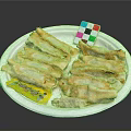 Crispy Fried Dumplings Served On White Plate With Yellow Sauce Packet And Colorful Small Card