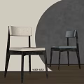 Wabi Sabi Style Dining Chairs with White and Dark Upholstered Seats and Wooden Frames