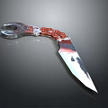 Decorative Metallic Knife With Red Chain Handle And Sharp Blade Design