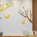 Kids Play Area Featuring Wall Tree Branch Decorations Green Leaves Yellow Birds And Stuffed Toys