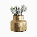 Elegant Golden Ceramic Vase with White Flowers and Textured Surface