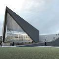 Modern Museum Building With Geometric Facade And Glass Curtain Wall Surrounded By Grassland And People