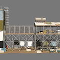 Industrial Tower with Metal Frame Platform and Storage Tank Surrounded by Equipment and Stacked Items