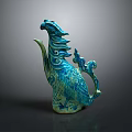 Sculpture Carving Of Phoenix Shaped Artwork With Blue Green Hue And Swirling Feathers
